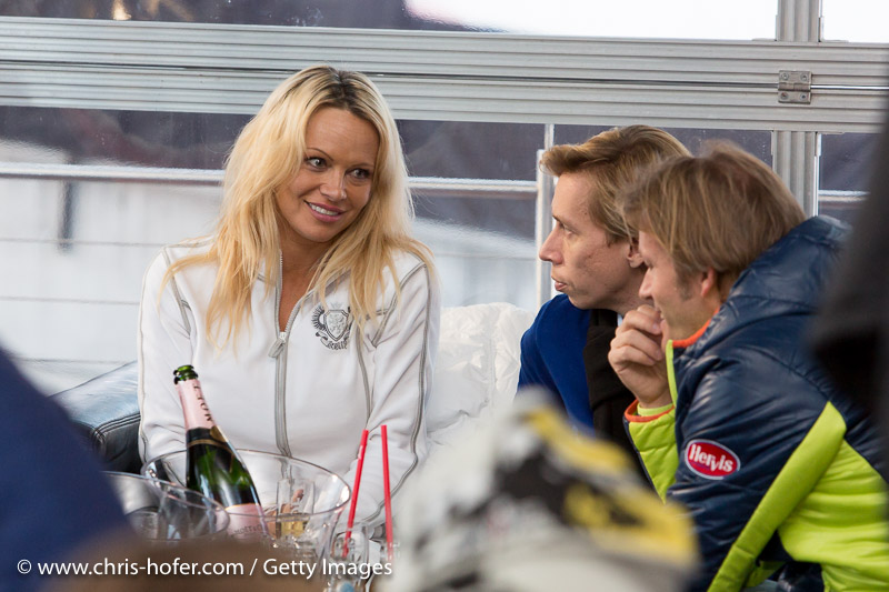 SAALBACH-HINTERGLEMM, AUSTRIA - DECEMBER 05:   Pamela Anderson with manager and event promoter during the third and final day of the Formula Snow 2015 ski opening on December 5, 2015 in Saalbach-Hinterglemm, Austria.  (Photo by Chris Hofer/Getty Images)